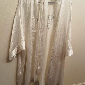 Victoria’s Secret white satin robe for brides.
